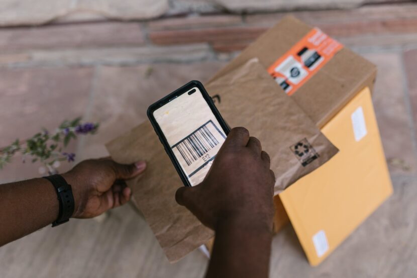 person holding black android smartphone
